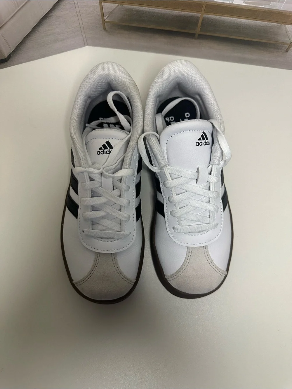 adidas White Sneakers with Black Stripes and Brown Sole
